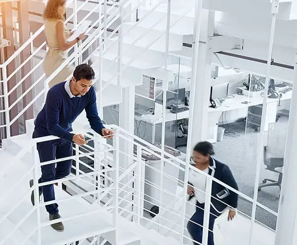 people in office staircase 